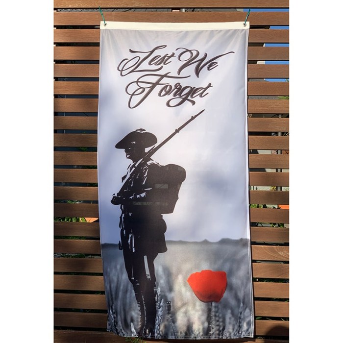 Lest We Forget Soldier and Poppy Fence Hung