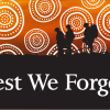 Silhouetted soldiers with Lest We Forget message