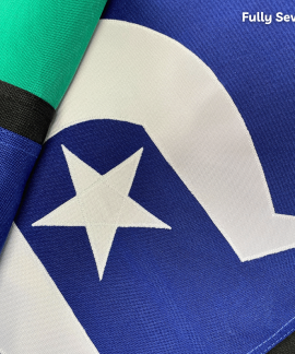 Colorful sewn flag with star and wave pattern