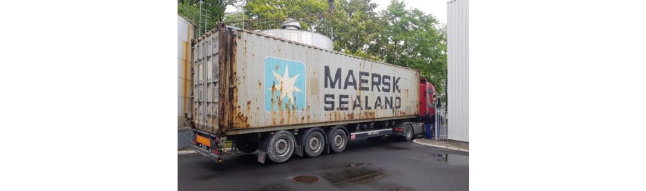 Rusty Maersk Sealand shipping container on truck